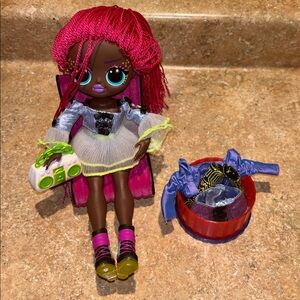 Stylish Doll with Vibrant Pink Hair and Shimmering Silver Outfit